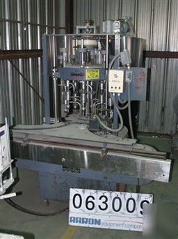 Used: us bottlers 8 head rotary gravity fillter. has 1/