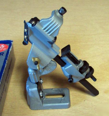 Drill grinder attachment tool to sharpen drill bits