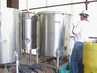 Used 230 gallon permasan stainless steel vertical tank