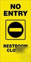2X fold-ups sign in yellow, no entry restroom closed