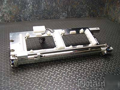 Wafer handling linear roller slide rail actuator 