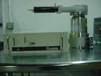 Osaka vacuum turbo pump model tg 373 with power supply