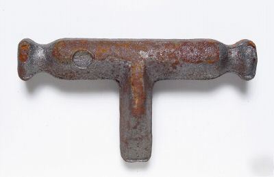 Field cultivator weld on spring mount