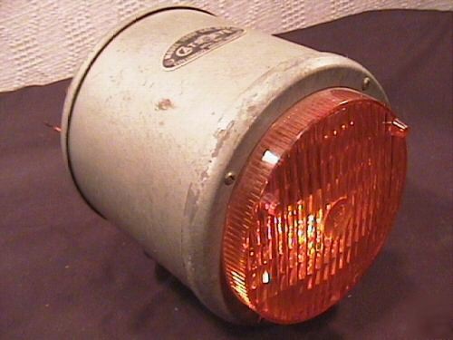 Vintage cats eye emergency signal flashing light