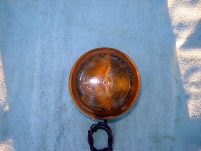 Amber rotating flashing light public safety equip corp.
