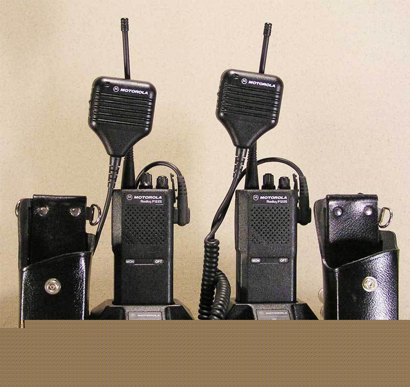 ** 2 motorola radius P1225 uhf 2 ch radios & chargers *